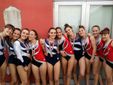 Foto di gruppo per le due squadre dell’Olimpia