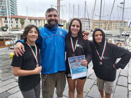 L'allenatore Antonio Marmorino con Edoardo Pogliotti, Lorenzo Imparato e Bianca Marmorino L'allenatore Antonio Marmorino con Edoardo Pogliotti, Lorenzo Imparato e Bianca Marmorino