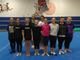 Alcune delle ginnaste dell’Olimpia in gara questa domenica: Annika Gérard, Giada De Gaetano, Serena Molinari, Rebecca Sergi, Elisa Raso, Alessandra Fiscella, Nicole Désandré, Giulia Barbato, Sara Del Monte e Nicole Trevisan
