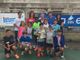 Foto di gruppo dei premiati con le autorità e la tennista valdostana Martina Caregaro