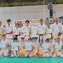 foto (in ordine) di gruppo finale, foto diplomi Dan, con il Maestro Carcassi, foto nuovi allenatori, istruttori e foto diplomi di kyu